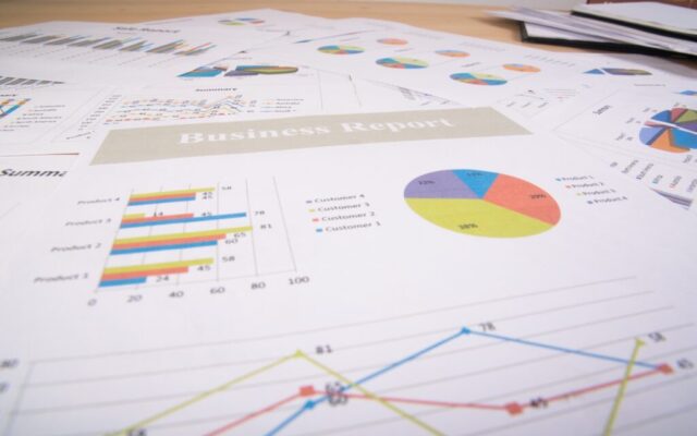 Business report. Graphs and charts. Business reports and pile of documents. Business concept.